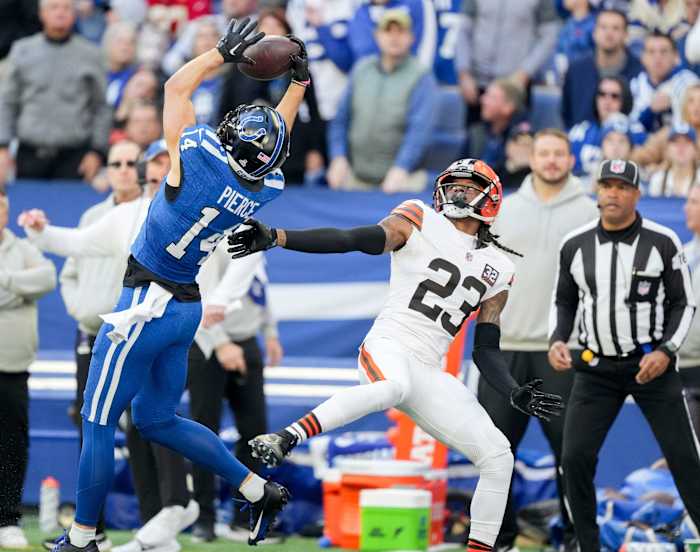 Indianapolis Colts wide receiver Alec Pierce (14) goes up to make a catch in front of Cleveland Browns cornerback Martin Emerson Jr. (23) on Sunday, Oct. 22, 2023, during a game against the Cleveland Browns at Lucas Oil Stadium in Indianapolis.